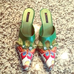 Fantastic green butterfly wedge shoes.